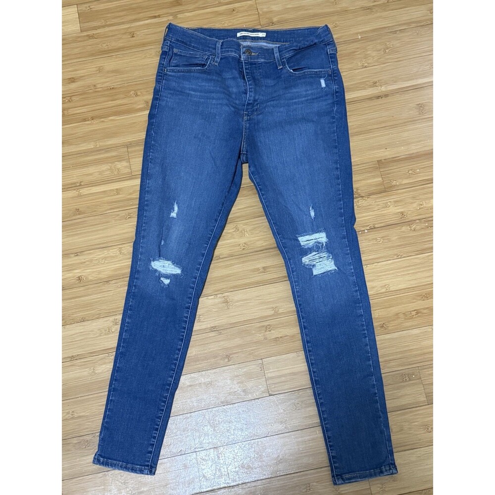 Levi’s 720 high rise skinny jeans women’s size 31 blue distressed denim